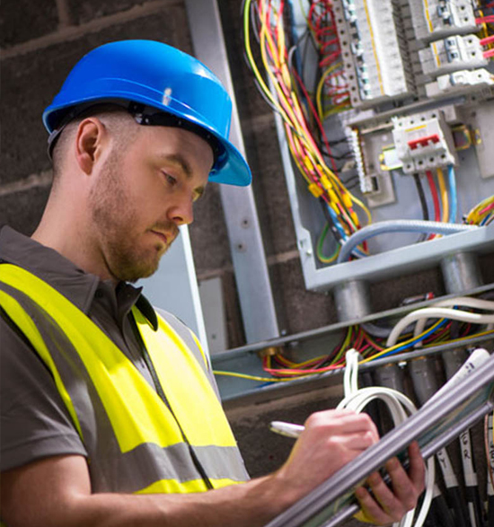 An electrician checking the wires